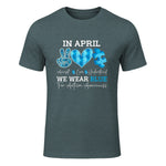 In April We Wear Blue Autism Awareness T-Shirt in Dark Heather - front view
