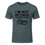 I'm Not Retired A Professional Papa in Dark Heather - front view