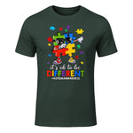 It's OK to Be Different Dabbing Puzzle Autism Awareness Kids in Forest Green - front view
